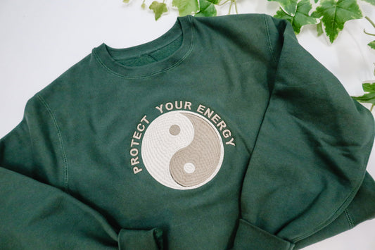 protect your energy embroidered premium crewneck sweatshirt
